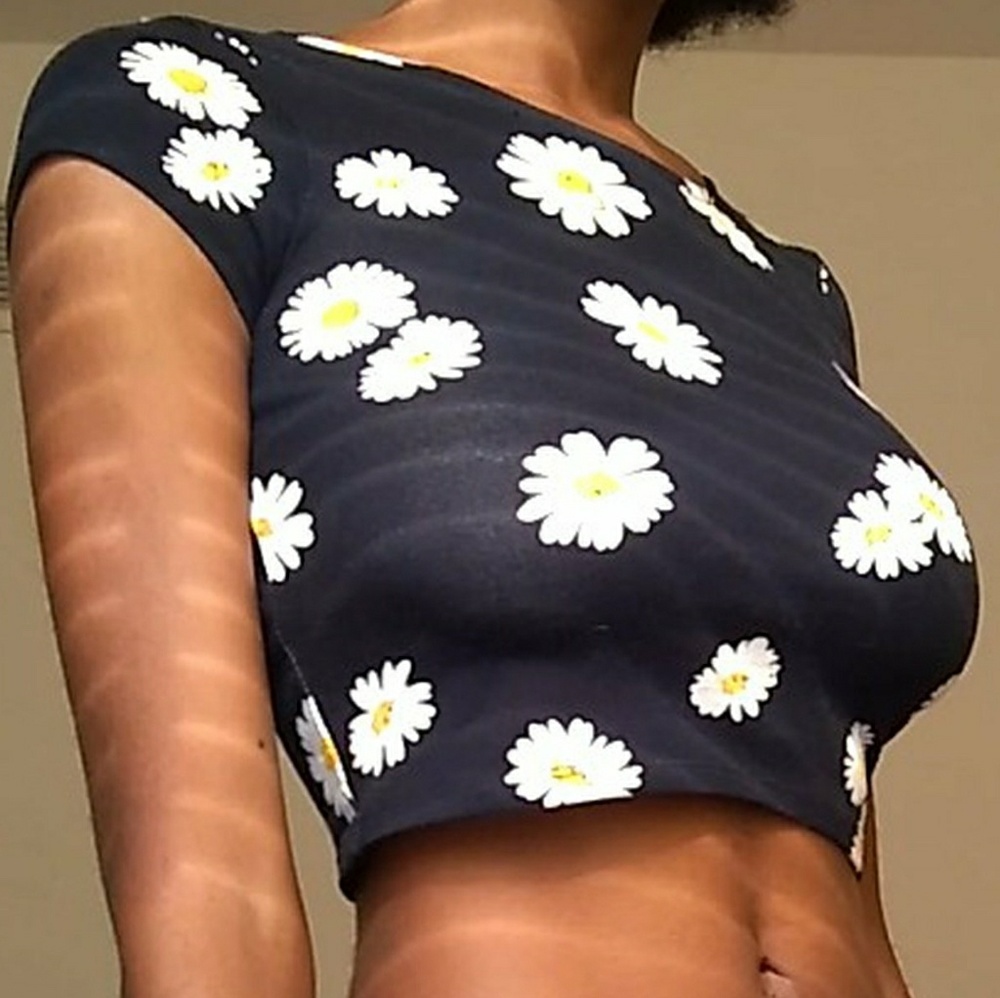 Very cute crop top with flowers on it